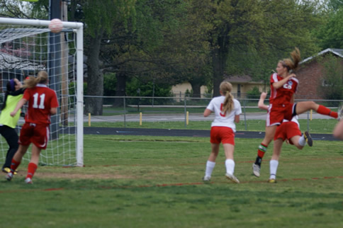 Emily Cline heads in the game winner against the Nixa Eagles.